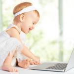 Toddler with a laptop