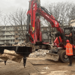 A grand piano being retrieved intact from the ruins on Tarwekamp, The Hague