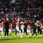 PSV players celebrate after the win over Liverpool FC during the UEFA Champions League match between PSV Eindhoven and Liverpool FC at Phillips Stadium on January 29, 2025 in Eindhoven, Netherlands.