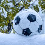 Football during a snowing day