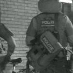 Police officers conducting raids in Amsterdam after criminals were a part of violent crime in Cologne,Germany.