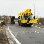 A truck carrying clay is overturned on the A8 motorway, January 28, 2025.