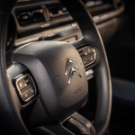 Citroen logo on a steering wheel of a Citroen car C3