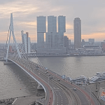 The sun peeking through the clouds at the Erasmus Bridge in Rotterdam, 31 January 2025