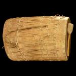 A Tigua double-headed drum and drumstick made from cottonwood and hide by the Ysleta del Sur Pueblo Native American tribe in the 19th century