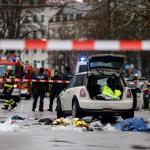 Members of the emergency services work at the scene where a car drove into a crowd in the southern German city of Munich on February 13, 2025 leaving several people injured, police said.