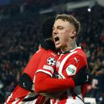 Ryan Flamingo of PSV Eindhoven, Noa Lang of PSV Eindhoven celebrate the 3-1 during the UEFA Champions league Play-off match between PSV Eindhoven and Juventus FC at Phillips Stadium on February 19, 2025 in Eindhoven, Netherlands.