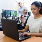 Learner driver using laptop to train for theory test