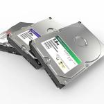 Three ATA Hard disk drives on a white background