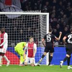 Ellyes Skhiri of Eintracht Frankfurt scores to make it 1-2. (l-r) Jorthy Mokio of Ajax, Anton Gaaei of Ajax, Ajax goalkeeper Jay Gorter, Ellyes Skhiri of Eintracht Frankfurt, Mario Götze of Eintracht Frankfurt during the UEFA Europa League match between AFC Ajax and Eintracht Frankfurt at Johan Cruijff ArenA on March 6, 2025 in Amsterdam, Netherlands.