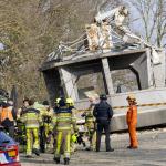 Workers surround the collapsed Wilhelminatoren, March 16, 2025.