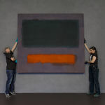 Art handlers from Museum Boijmans Van Beuningen install Mark Rothko’s Grey, Orange on Maroon, No. 8 (1960) at the Stedelijk Museum Schiedam.