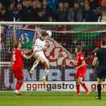 Guus Til of PSV Eindhoven (m) scores 1-2 during the Dutch Eredivisie match between FC Twente and PSV at Stadion De Grolsch Veste on April 24, 2025 in Enschede, Netherlands.