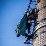 Pro-Palestine activist that climbed on to one of the chimneys of a former boiler house on the grounds of Radboud University Medical Center Nijmegen.