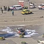 A car believed to be intentionally set on fire at Dam Square in Amsterdam. 3 April 2025