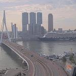 A warm Friday morning in Rotterdam with the Mein Schiff 3 ship docked at the Cruise Terminal near the Erasmus Bridge. 2 May 2025