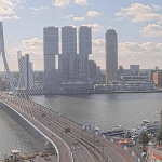 Fluffy clouds above the Erasmus Bridge on a chilly spring day in Rotterdam, 6 May 2025