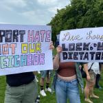 Demonstrators carry banners at “No Tyrants” rally in Amsterdam opposing U.S. authoritarianism, June 14, 2025.