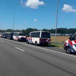 Dutch police vans ready to escort world leaders between Schiphol Airport and the NATO summit in The Hague, 24 June 2025