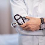 Male doctor with stethoscope