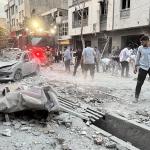 The aftermath of an Israeli airstrike was visible in one Tehran neighborhood, where firefighters and residents navigated the rubble. 13 June 2025
