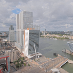 Some blue sky peeking through the clouds in Rotterdam, viewed from the Erasmus Bridge. 30 July 2025