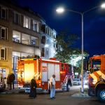 Emergency services at the scene of a fire likely caused by an explosion on Brahmslaan in Eindhoven on 7 August 2025. Three people were badly hurt