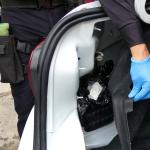 Police discover a small cache of cocaine hidden in a car