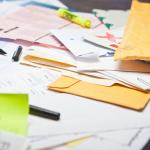 Different papers scattered on a table