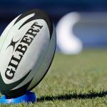 Rugby ball on a tee.