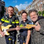 Police recver Ivo Severijns' bass guitar 13 years after it was stolen, October 2025