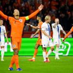 Cody Gakpo of the Netherlands celebrates scoring a goal at the Johan Cruijff ArenA during the Dutch national team's 2026 FIFA World Cup qualifying match against Finland.