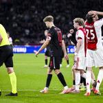 Referee Jeroen Manschot after a foul by Wout Weghorst of Ajax on Sven Mijnans of AZ Alkmaar during the Dutch Eredivisie match between AFC Ajax and AZ at the Johan Cruyff ArenA on October 18, 2025, in Amsterdam, the Netherlands.