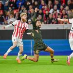 Niklas Beste (SC Freiburg, #19) and Souffian El Karouani (FC Utrecht, #16) in action in action during the UEFA Europa League league phase match between SC Freiburg and FC Utrecht, in Freiburg, Germany, 23 October 2025.