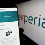 A smartphone with Nexperia's products in front of the company's logo