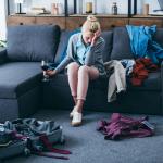 A woman is packing after a break-up