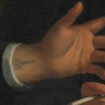 A tattoo of a comet seen on the wrist of a subject in a portrait of the Chief Commissioners of the Amsterdam Harbor Works, 1674, by Wallerant Vaillant.