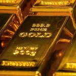 Solid gold bars stored in a black case. 2021