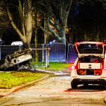 A car crashed into a tree, flipped, and caught on the crossing of Bezuidenhoutseweg and Reigersbergenweg during a police chase in The Hague, 4 December 2025