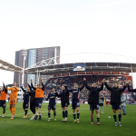 PSV players celebrate the 2–1 victory after the Dutch Eredivisie match between FC Utrecht and PSV Eindhoven at Stadion Galgenwaard on December 21, 2025, in Utrecht, the Netherlands.