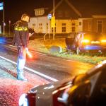 Police direct traffic after a driver loses control on an icy section of the N231 in Aarlanderveen, Zuid-Holland. 31 Dec. 2025