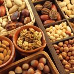 Varieties of nuts: peanuts, chestnuts, hazelnuts, walnuts, pistachio, and pecans.
