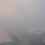 A barely visible Erasmus Bridge on a foggy morning in Rotterdam, 5 December 2025