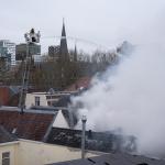 Firefighters try to extinguish flames after an explosion took place on Visscherssteeg in the city center of Utrecht. 15 Jan. 2026
