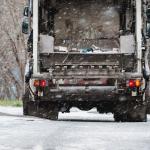 Garbage truck in snow