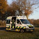 Animal ambulance volunteer in an animal ambulance with cages for animals