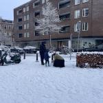 A family building a snowman in Amsterdam-Oost. 5 Jan. 2026
