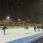 People ice skating in the snow in Amsterdam, 4 January 2025