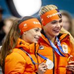 Femke Kok and Jutta Leerdam during the medal ceremony following the 1,000 meters in long-track speed skating at the Milano Speed Skating Stadium at the Milan Winter Olympics.