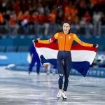Femke Kok takes gold in the 500m speed skating event at the Milano Speed Skating Stadium during the Milan Winter Olympics.